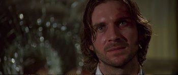 Movie still from “Strange Days” (1995), directed by Kathryn Bigelow – A person with long hair; Close Up shot, Low angle