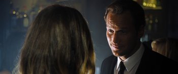 Movie still from “Stretch” (2014), directed by Joe Carnahan – A man and a woman talking to each other; Close Up shot, Over the shoulder angle