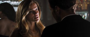 Movie still from “Stretch” (2014), directed by Joe Carnahan – A man and a woman talking to each other; Close Up shot, Over the shoulder angle