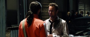 Movie still from “Stretch” (2014), directed by Joe Carnahan – A man and a woman talking to each other; Close Up shot, Over the shoulder angle