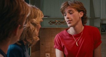 Movie still from “Summer of 85” (2020), directed by François Ozon – A man and a woman talking to each other; Close Up shot, Over the shoulder angle