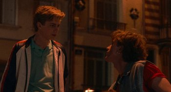 Movie still from “Summer of 85” (2020), directed by François Ozon – A man and a woman talking to each other; Medium shot, Over the shoulder angle