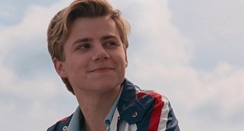 Movie still from “Summer of 85” (2020), directed by François Ozon – A person wearing a jacket; Close Up shot, Over the shoulder angle