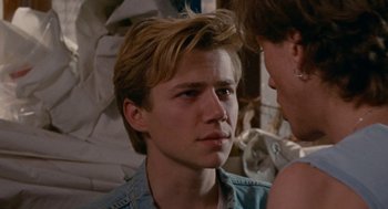 Movie still from “Summer of 85” (2020), directed by François Ozon – A young man and a young woman are looking at each other; Close Up shot, Over the shoulder angle
