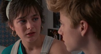 Movie still from “Summer of 85” (2020), directed by François Ozon – A young woman and a young man talking to each other; Close Up shot, Over the shoulder angle