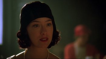 Movie still from “Sunshine” (1999), directed by István Szabó – A person wearing a hat; Close Up shot, Over the shoulder angle