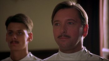 Movie still from “Sunshine” (1999), directed by István Szabó – A person with a mustache; Close Up shot, Low angle