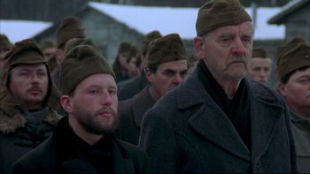 Movie still from “Sunshine” (1999), directed by István Szabó – A group of men wearing hats and coats in a row; Close Up shot, Low angle
