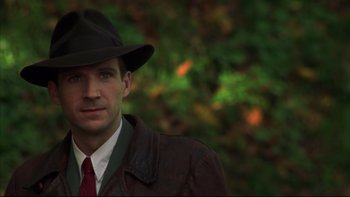 Movie still from “Sunshine” (1999), directed by István Szabó – A man wearing a hat and a jacket; Close Up shot, Low angle