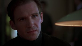 Movie still from “Sunshine” (1999), directed by István Szabó – A person wearing a black shirt; Close Up shot, Over the shoulder angle