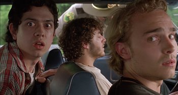 Movie still from “Super Troopers” (2001), directed by Jay Chandrasekhar – A group of people sitting in a car; Close Up shot, Low angle