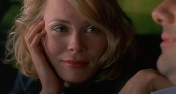 Movie still from “Super Troopers” (2001), directed by Jay Chandrasekhar – A woman's face with her hand on her chin; Close Up shot, Over the shoulder angle