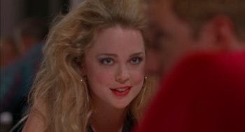 Movie still from “Super Troopers” (2001), directed by Jay Chandrasekhar – A person with blonde hair and blue eyes; Close Up shot, Over the shoulder angle