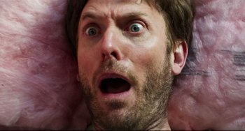 Movie still from “Super Troopers 2” (2018), directed by Jay Chandrasekhar – A man's face as he looks surprised; Extreme Close Up shot, Overhead angle