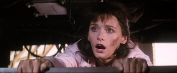 Movie still from “Superman II” (1980), directed by Richard Lester – A person with her mouth wide open; Close Up shot, Low angle