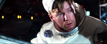 Movie still from “Superman II” (1980), directed by Richard Lester – A person wearing a helmet; Close Up shot, Overhead angle