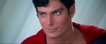 Movie still from “Superman II” (1980), directed by Richard Lester – A man with blue eyes; Close Up shot, Over the shoulder angle