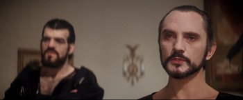 Movie still from “Superman II” (1980), directed by Richard Lester – A man and a woman standing next to each other in a room; Close Up shot, Over the shoulder angle