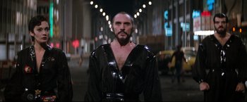 Movie still from “Superman II” (1980), directed by Richard Lester – A man with a beard wearing a black robe; Medium shot, Low angle