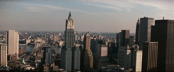Movie still from “Superman III” (1983), directed by Richard Lester – A view of a large city from a high point of view; Extreme Wide shot, High angle