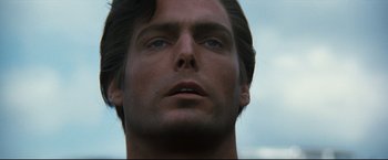 Movie still from “Superman III” (1983), directed by Richard Lester – A man's face looking upward; Close Up shot, Low angle