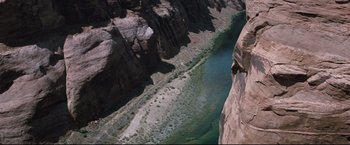Movie still from “Superman III” (1983), directed by Richard Lester – A view of a river from a helicopter; Extreme Wide shot, Overhead angle