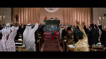 Movie still from “Superman IV: The Quest for Peace” (1987), directed by Sidney J. Furie – A man dressed as superman in front of an audience; Extreme Wide shot, High angle
