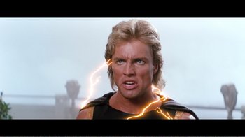 Movie still from “Superman IV: The Quest for Peace” (1987), directed by Sidney J. Furie – A man that is in the middle of a scene; Close Up shot, Low angle