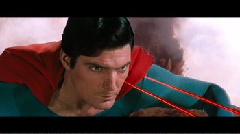 Movie still from “Superman IV: The Quest for Peace” (1987), directed by Sidney J. Furie – A person wearing a superman costume; Medium shot, High angle