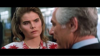 Movie still from “Superman IV: The Quest for Peace” (1987), directed by Sidney J. Furie – A man and a woman talking to each other; Close Up shot, Over the shoulder angle