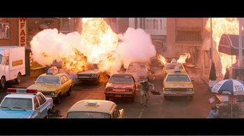 Movie still from “Superman IV: The Quest for Peace” (1987), directed by Sidney J. Furie – An image of an explosion in the middle of a city street; Extreme Wide shot, High angle