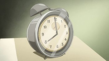 Movie still from “Superman/Shazam!: The Return of Black Adam” (2010), directed by Joaquim Dos Santos – An illustration of an alarm clock on top of a table; Extreme Close Up shot, High angle