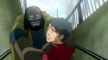Movie still from “Superman/Shazam!: The Return of Black Adam” (2010), directed by Joaquim Dos Santos – An animated man is hugging a young boy; Medium shot, Over the shoulder angle