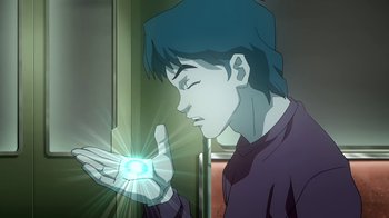 Movie still from “Superman/Shazam!: The Return of Black Adam” (2010), directed by Joaquim Dos Santos – A man holding a light in his hand; Close Up shot, High angle