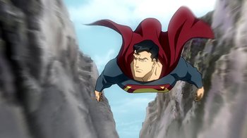 Movie still from “Superman/Shazam!: The Return of Black Adam” (2010), directed by Joaquim Dos Santos – A man flying through the air over a cliff; Wide shot, Low angle