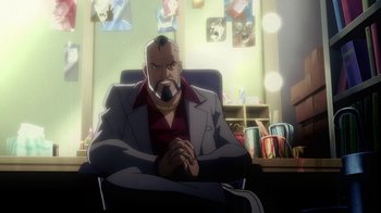 Movie still from “Superman/Shazam!: The Return of Black Adam” (2010), directed by Joaquim Dos Santos – A man sitting in a chair in front of a window; Medium shot, Over the shoulder angle