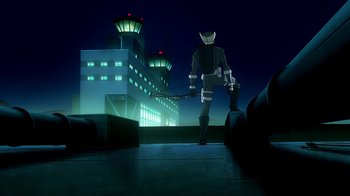 Movie still from “Superman/Shazam!: The Return of Black Adam” (2010), directed by Joaquim Dos Santos – A man walking on the sidewalk in front of a building; Wide shot, Low angle