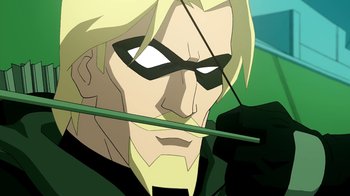 Movie still from “Superman/Shazam!: The Return of Black Adam” (2010), directed by Joaquim Dos Santos – A man with a green arrow in his mouth; Close Up shot, Over the shoulder angle