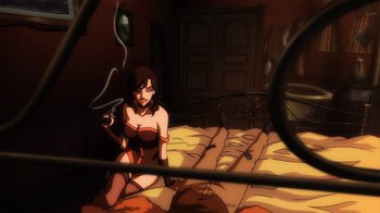 Movie still from “Superman/Shazam!: The Return of Black Adam” (2010), directed by Joaquim Dos Santos – A woman in lingerie sitting on top of a bed; Wide shot, High angle