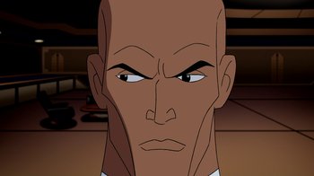 Movie still from “Superman: Doomsday” (2007), directed by Bruce Timm – An animated face of a man with a bald head; Close Up shot, Low angle