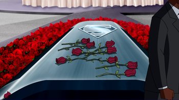Movie still from “Superman: Doomsday” (2007), directed by Bruce Timm – A bunch of red roses on the side of a casket; Wide shot, Overhead angle