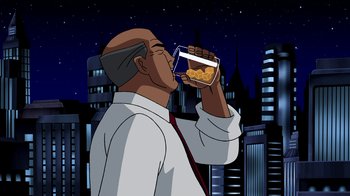 Movie still from “Superman: Doomsday” (2007), directed by Bruce Timm – An animated picture of a man drinking a glass of beer; Medium shot, Over the shoulder angle