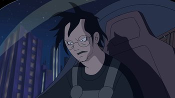 Movie still from “Superman: Doomsday” (2007), directed by Bruce Timm – An animated man wearing glasses and a black shirt; Medium shot, High angle