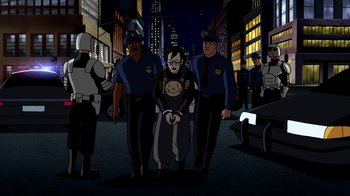 Movie still from “Superman: Doomsday” (2007), directed by Bruce Timm – A group of men standing next to each other on a street; Wide shot, Over the shoulder angle