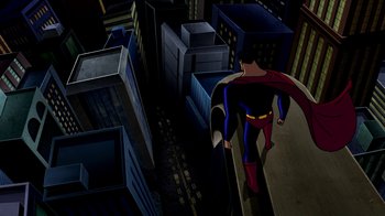 Movie still from “Superman: Doomsday” (2007), directed by Bruce Timm – A cartoon of a man in a superman costume walking down a street; Extreme Wide shot, Low angle