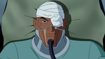 Movie still from “Superman: Doomsday” (2007), directed by Bruce Timm – An animated man with a bandage on his head; Close Up shot, High angle