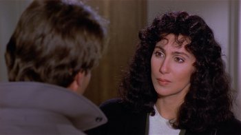 Movie still from “Suspect” (1987), directed by Peter Yates – A man and a woman talking to each other; Close Up shot, Over the shoulder angle