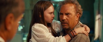 Movie still from “Swing Vote” (2008), directed by Joshua Michael Stern – A young girl and an older man looking at each other; Close Up shot, Over the shoulder angle