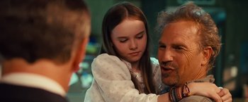 Movie still from “Swing Vote” (2008), directed by Joshua Michael Stern – A young girl and an older man looking at each other; Close Up shot, Over the shoulder angle