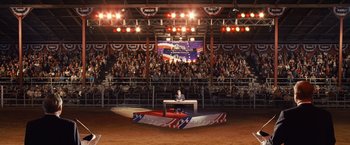 Movie still from “Swing Vote” (2008), directed by Joshua Michael Stern – An audience is watching an event in a stadium; Extreme Wide shot, High angle
